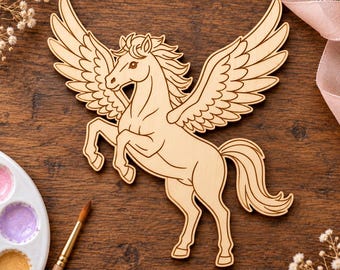 May include: A light-colored wooden cutout of a winged horse, or Pegasus, featuring detailed engraved lines defining the mane, tail, and feathers of the wings. The figure is depicted in a rearing pose with its front legs lifted and wings spread wide.