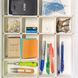 Modular Drawer Organization Dividers for IKEA ALEX Desk | Custom Storage Organizer | Desk Drawer Inserts for Office, Craft & Home, make up organizer, bathroom drawer organizer, desk organizer, kitchen storage, kitchen organization, bathroom organizer, drawer inserts, May include: A white drawer organizer with multiple compartments. The drawer contains hair accessories, pens, and other small objects. The text on the image reads Modular Design & Perfect Fit for IKEA Alex Drawer