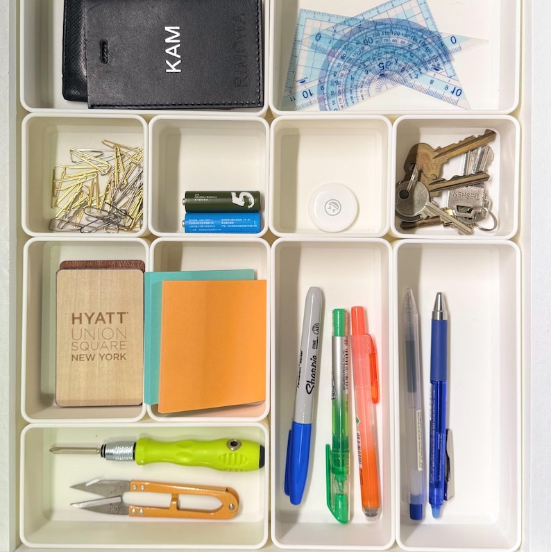 Modular Drawer Organization Dividers for IKEA ALEX Desk | Custom Storage Organizer | Desk Drawer Inserts for Office, Craft & Home, make up organizer, bathroom drawer organizer, desk organizer, kitchen storage, kitchen organization, bathroom organizer, drawer inserts, May include: A white drawer organizer with multiple compartments. The drawer contains hair accessories, pens, and other small objects. The text on the image reads Modular Design & Perfect Fit for IKEA Alex Drawer