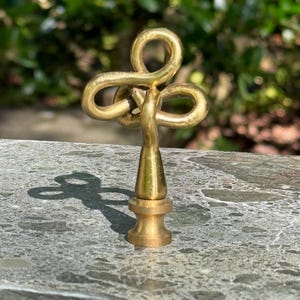 Embout de lampe à noeud en laiton