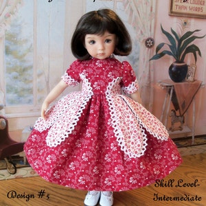 May include: A red and white floral dress with white lace trim for a 13-inch doll. The dress has a fitted bodice and a full skirt. The doll is wearing white shoes. The text "Farmcookies Designs" and "Sewing Pattern for 13" Little Darling" is at the top of the image. The text "Design #5" is at the bottom left of the image. The text "Skill Level- Intermediate" is at the bottom right of the image. The text "Historical Petal Gown" is at the bottom center of the image.