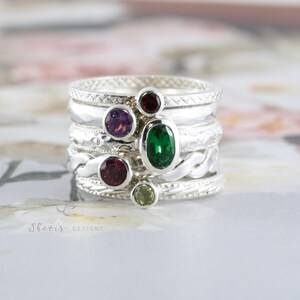 Another set of 5 rings with birthstones. These bands show the shiny classic finish.