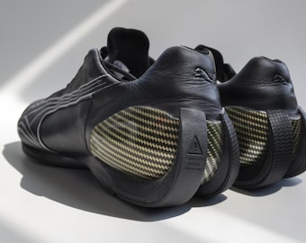 Zapatillas de conducir Puma vintage de cuero negro Y2K, talla UK 12