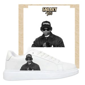 May include: White trainers with a black and white image of a person wearing a Compton hat and sunglasses. The trainers have a thick white sole. The image also includes a black and white portrait and the text "Sneaky Tats".