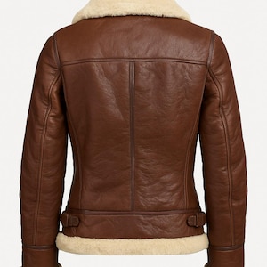 Back view of women’s brown leather shearling bomber jacket with fur lining – luxury winter outerwear