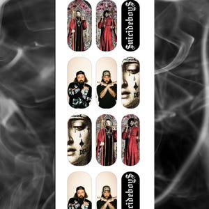 May include: Nail art stickers featuring various designs. The designs include images of men in red robes, a face with a tear, and the text "Suicideboys". The stickers also include the text "A Touch of Evil".