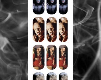 May include: Nail art decals with horror-themed imagery. The designs include a werewolf, a woman smoking, a couple in red, and a vampire with fangs. The text "A Touch of Evil" is displayed at the top and bottom of the image.