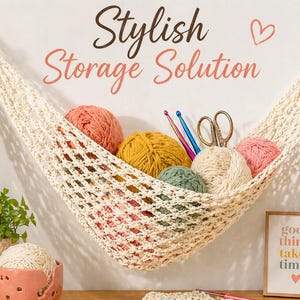 May include: A cream-coloured, crocheted hammock filled with colourful yarn balls, crochet hooks, and scissors. The text "Stylish Storage Solution" is displayed above the hammock. A framed sign reads "good things take time."