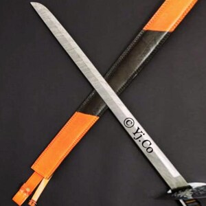 May include: A silver sword with a textured blade is crossed over a black and orange sheath. The sheath is black with orange accents and a leather strap. The text "© Yj.Co" is printed on the blade.