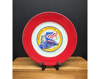 Plato conmemorativo del Bicentenario de 1976 del Tren de la Libertad Estadounidense, con borde rojo y dorado.