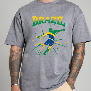 Brazil Soccer Player Silhouette Flag Design | Powerful Football Art | National Pride Sports Graphic Athletic Heather