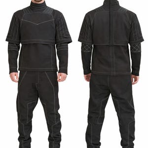 May include: A black two-piece outfit consisting of a long-sleeved top and matching pants. The top features a high collar, a layered chest panel, and white contrast stitching. The pants have a relaxed fit with white stitched seam detailing.