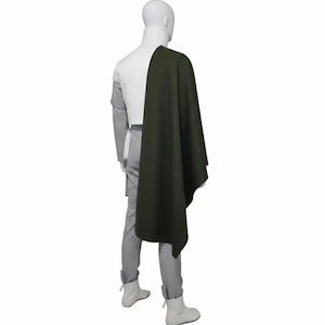 May include: A costume consisting of a white top, gray pants, and white boots. A dark green cape is draped over the shoulder. The mannequin is facing away from the camera.