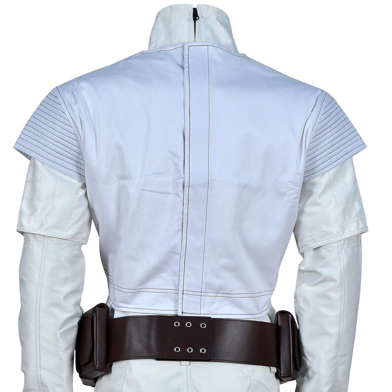 May include: A white jacket with a high collar and a brown belt with two pouches. The jacket has a zipper and stitching details. The shoulders have a layered design with horizontal lines. The sleeves are long and white.