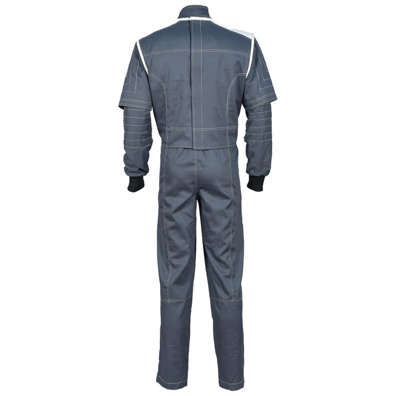 May include: A gray racing suit with white stitching and accents. The suit has long sleeves with black cuffs and a high collar. The back of the suit is visible, showing the zipper and seam details. This one-piece garment is designed for motorsports.