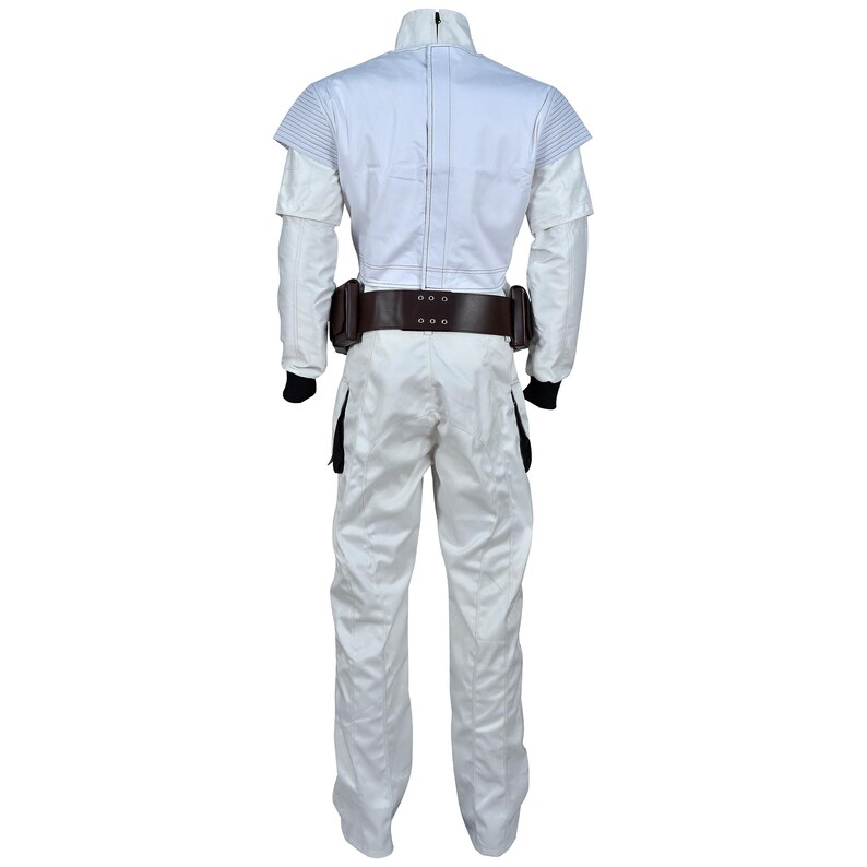 May include: A white jumpsuit with a high collar and a brown belt with pouches. The costume has black cuffs and a zipper down the front. The shoulders have a layered design.
