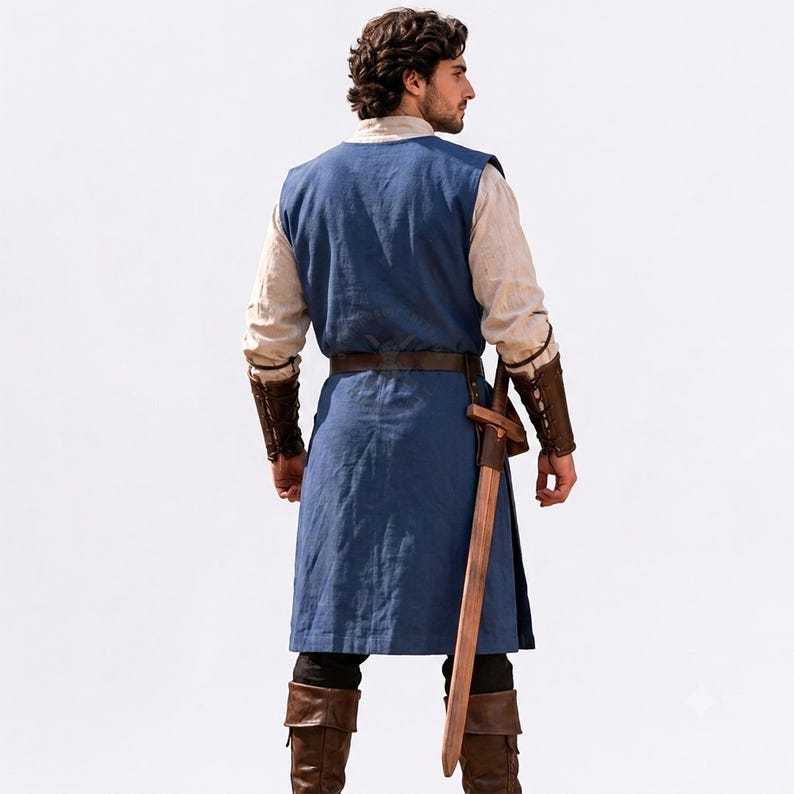 May include: A blue sleeveless tunic worn over a beige long-sleeved shirt, paired with brown leather arm bracers, a brown leather belt, and brown leather boots. A wooden sword in a brown leather scabbard hangs from the belt at the waist.