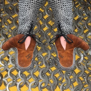 Chainmail hauberk size reference showing length and chest coverage for medieval armor buyers