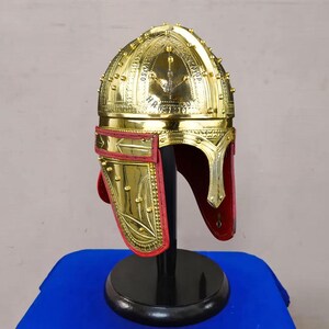 Close-up of 18 gauge brass Roman helmet highlighting handmade detailing and polished surface
