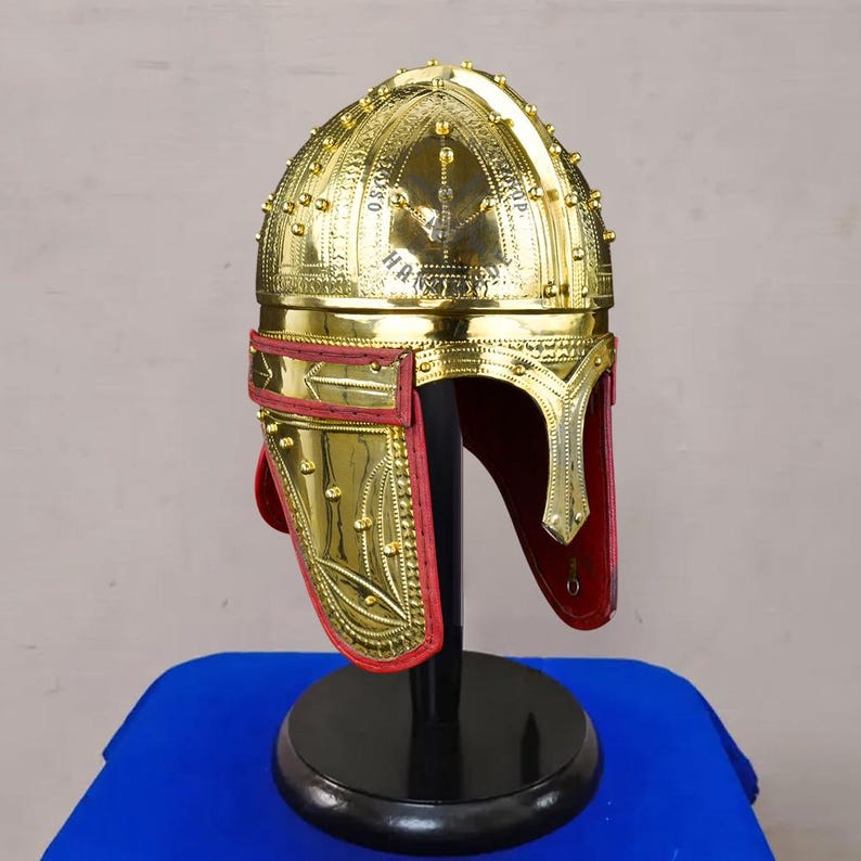 Close-up of 18 gauge brass Roman helmet highlighting handmade detailing and polished surface