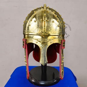 Side profile of brass Roman Deurne helmet showing detailed craftsmanship and historical shape