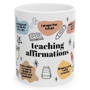 May include: White ceramic mug with the words "teaching affirmations" and various illustrations. The mug features affirmations such as "I shape the future" and "Every child in my class is capable of growth and greatness."