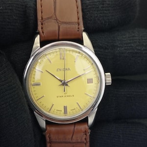 Vintage Enicar Star Jewels Hand-Winding Swiss Mens Yellow Dial Date Watch B700138-1