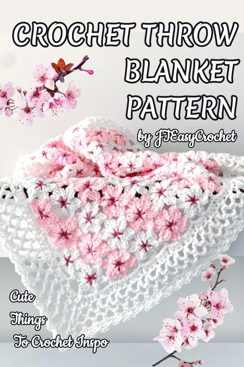 May include: A crochet throw blanket pattern with a floral design in white and pink. The blanket features a repeating flower pattern and is displayed with cherry blossom branches. Text on the image reads "CROCHET THROW BLANKET PATTERN by JEasyCrochet."