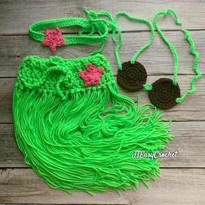 May include: A neon green crochet outfit with a headband, skirt, and two bra cups. The headband and skirt are adorned with pink star-shaped embellishments. The bra cups are brown and connected by green yarn.