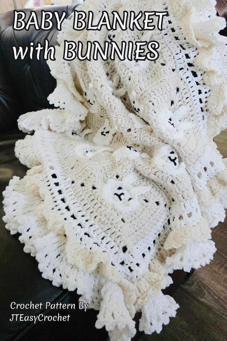 Beautiful Bunny  granny square blanket with fringed edging is laying on a dark leather couch. The blanket is cream with white bunnies on each square. The lettering says: “Baby Blanket With Bunnies”, “Crochet Pattern By JTEasyCrochet” meaning that JTEasyCrochet has the best crochet patterns and fun crochet ideas.
