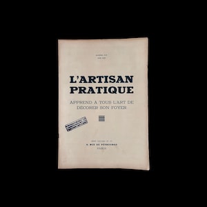 May include: A vintage book cover with the title "L'ARTISAN PRATIQUE" in navy blue text. The cover is aged with a light beige hue and features additional text in French, including the address "9, RUE DE PETROGRAD, PARIS".