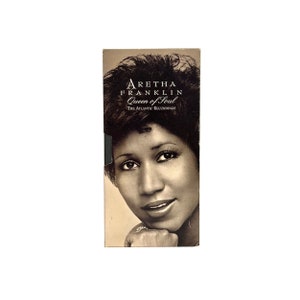 May include: A sepia-toned album cover featuring Aretha Franklin. The text "ARETHA FRANKLIN Queen of Soul The Atlantic Recordings" is displayed at the top. Franklin's portrait is in the center, with her hand near her chin.