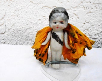 Vintage porcelain bisque kewpie doll with paper wings
