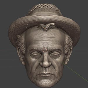 May include: A detailed, grayscale sculpture of a man's face wearing a hat. The sculpture has realistic features, including wrinkles and detailed hair. The hat has a woven pattern on the top. The face is centered and the eyes are closed.