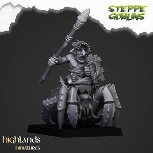 May include: A gray miniature figure of a goblin riding a crab-like creature, holding a spear and shield. The figure is on a black base, with the words "Steppe Goblins" and "highlands miniatures" visible.