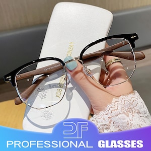 May include: Black and wood-tone eyeglasses with a half-rim design. The glasses have clear lenses and are held in front of a white case. The text "PROFESSIONAL GLASSES" is displayed at the bottom of the image.