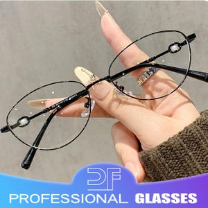 Ovales Retro Vollrand Brillengestell, Strahlend schwarze Damen Anti-Blaulicht Brille