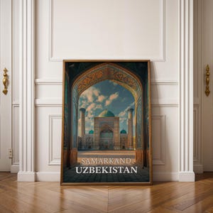 May include: A framed print featuring a detailed architectural view of a building in Uzbekistan, framed by an ornate archway. The print has a wooden frame and the text "SAMARKAND UZBEKISTAN" is displayed at the bottom.