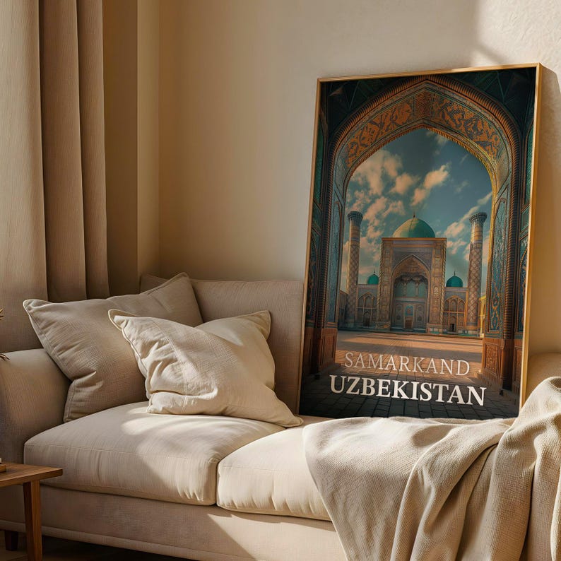 May include: A framed print featuring a detailed architectural image of Samarkand, Uzbekistan. The artwork showcases a grand archway leading to a mosque with turquoise domes and intricate detailing. The text "SAMARKAND UZBEKISTAN" is displayed at the bottom.