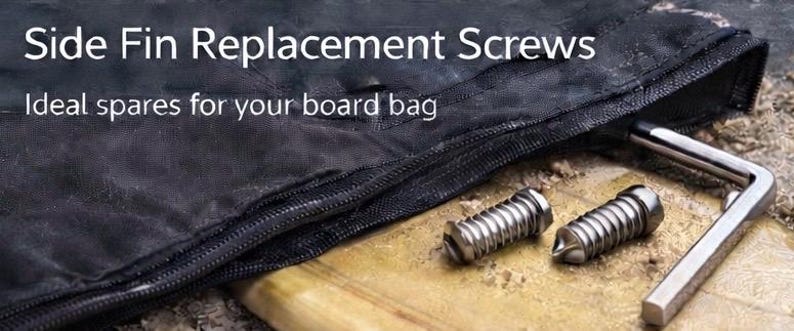 May include: Image shows side fin replacement screws and an L-shaped wrench. The screws are silver and cylindrical with a slotted head. The text reads "Side Fin Replacement Screws" and "Ideal spares for your board bag".