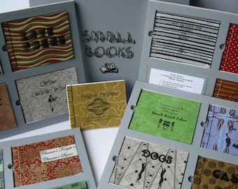 Small Books: 16 Hand-made, "Artisan" Books Inset in Framed Pages, Thumb Holes for Easy Retrieval, Housed in a Reinforced Clamshell Box