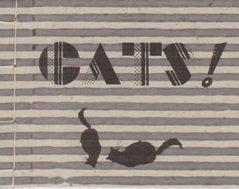 Cats--An illustrated book of quotations by famous authors. Sample: "The dog did it."