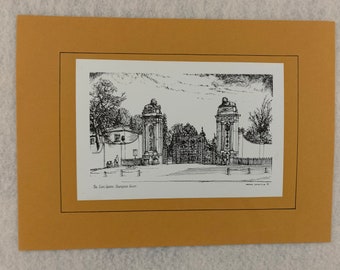 May include: A black and white pen and ink drawing of the Lion Gates at Hampton Court Palace. The drawing shows the gates with two towers and a lion statue on top of each tower. The drawing is framed in a brown mat.