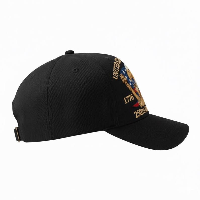 May include: Black baseball cap with a curved brim and adjustable strap. The cap features a design with the text "UNITED STATES" and the numbers "1776" and "250th" in gold and red, with a patriotic emblem.