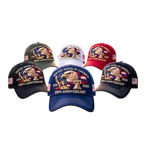 May include: A collection of baseball caps in various colors, including navy, black, red, white, and green. Each cap features an eagle graphic, the American flag, and the text "UNITED STATES OF AMERICA 250TH ANNIVERSARY 1776-2026".