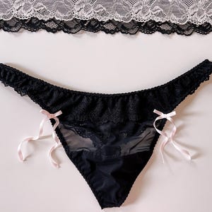 Black mens lace thong with pink ribbons - men’s underwear