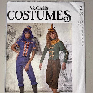 May include: McCall's Costumes pattern featuring two costume designs. One costume is a blue jumpsuit with a zig-zag design, the other is a green jacket and brown pants. The pattern includes sizes E5 (14-16-18-20-22).