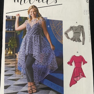 May include: McCall's sewing pattern featuring a woman wearing a polka dot dress. The pattern includes multiple view options and the text "#PortiaMcCalls". The size range is RR (18W-20W-22W-24W).