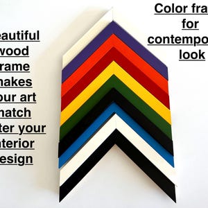 May include: A collection of colorful wood picture frames in various colors, including white, black, blue, green, yellow, red, and purple. Text on the left reads "Beautiful wood frame makes your art match better your interior design."
