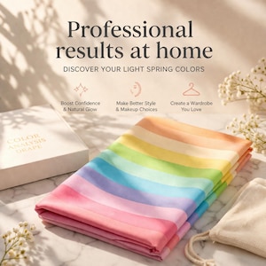 May include: A folded rainbow-striped fabric drape with the text "Professional results at home" and "Discover your light spring colors." The drape is in shades of pink, orange, yellow, green, blue, and purple. A box labeled "Color Analysis Drape" is also visible.